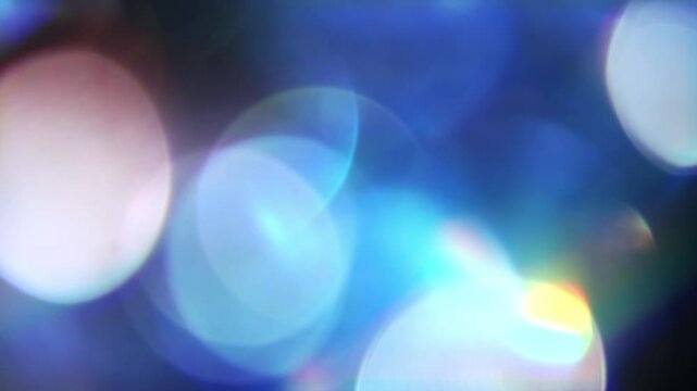 青い玉ボケがきらめく実写のトランジション・ライトリーク素材 - Powered by Adobe