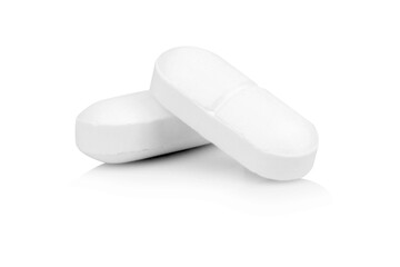 White pill isolated on white background