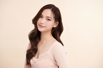 Beautiful young asian woman with clean fresh skin on beige background, Face care, Facial treatment, Cosmetology, beauty and spa, Asian women portrait.