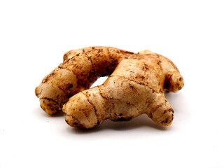 A ginger root or jahe isolated on a clean white background. Ginger Known for its strong aromatic scent and spicy kick, ginger is a widely used ingredient in culinary practices around the world
