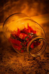 A rustic collection of red chili peppers, garlic, and dill in warm golden lighting. Close-ups and creative compositions highlight textures, spices, and natural ingredients, evoking a cozy, traditional