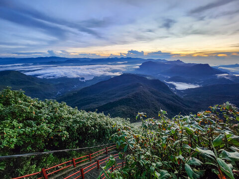 Adam's Peak is a 2,243 m (7,359 ft)-tall conical sacred mountain located in central Sri Lanka.