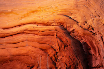 Vibrant red rock formations with natural lines
