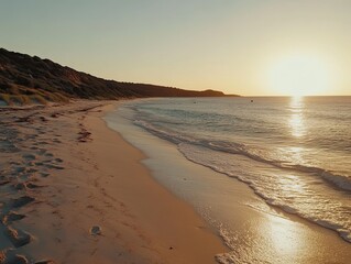 Sunset beach, ocean waves, coastal dunes, tranquil scene, holiday background