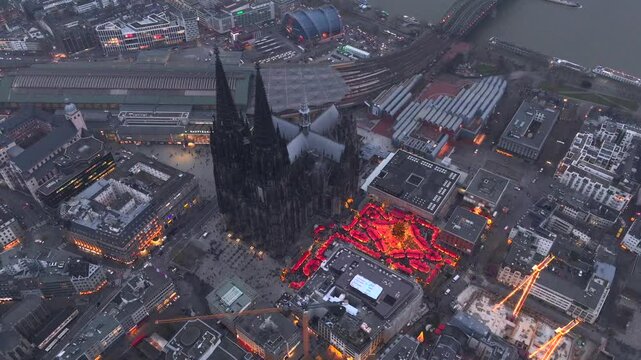 Cologne Cathedral Christmas Market. Traditional German Winter Weihnachtsmarkt in Koln, Germany. Aerial Drone Shot