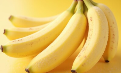 Fresh yellow bananas on a bright background