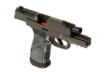 A khaki-colored semi-automatic pistol with a textured grip, visible barrel, and slide partially...