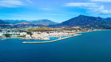 aerial view Puerto Banús and the marina, habor with luxury yachts, prominent Pico de la Concha mountain behind, Marbella, Malaga, Costa del Sol, Spain