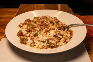 A bowl of risotto and lentils ready to eat
