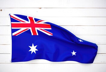 Australian flag against white wooden background