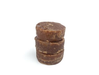 Brown palm sugar isolated on white background 