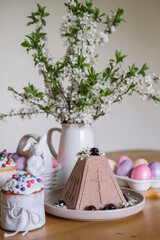 Easter cakes, painted eggs, chocolate cottage cheese paskha for a festive Easter dinner. Traditional Easter food