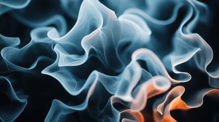 Obraz premium An abstract image of swirling smoke, showcasing fluid shapes and colors, creating a dynamic and ethereal visual effect.