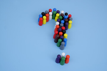 Many colorful people figures shaped as question marks on blue background.