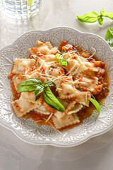 ravioli in tomato sauce with basil