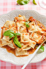ravioli in tomato sauce with basil