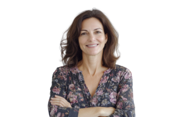 Portrait of 50 years old smiling woman looking at camera with crossed arms. Happy girl standing in creative office. Successful businesswoman standing in white background	