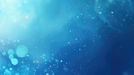 Obraz premium A serene blue background with soft bokeh effects, evoking calmness and tranquility.