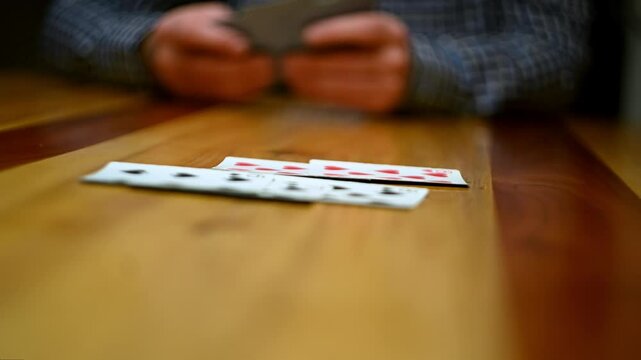 Cinematic close-up stock videos that bring the world of card games to life.  Expertly shot with attention to detail, these clips feature dramatic lighting and smooth camera movements.
