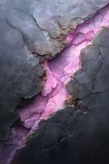 Fototapeta premium A striking image of a cracked surface displaying vibrant pink hues against a dark, textured background, showcasing natural geological formations.