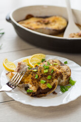 Baked fish with lemon and herbs