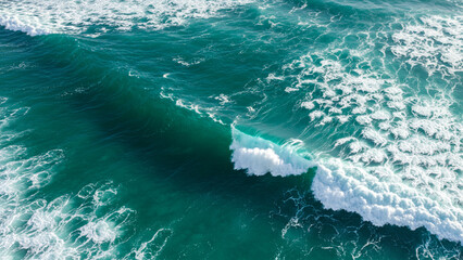 Fototapeta premium Aerial perspective of ocean waves crashing against each other