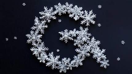 Snowflakes forming your brand's initials 