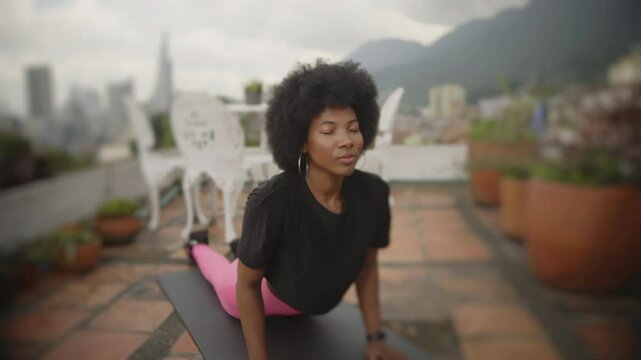 A Black Woman&rsquo;s Yoga Practice in the city Black Model Smiling Happy Relaxing