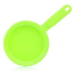 A set of children's toy dishes isolated on a white background. Plastic frying pan, lid and spatula. Children's kitchen. Educational role-playing games for children