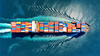 Global Shipping: Aerial View of a Fully Loaded Cargo Ship Navigating the Open Seas with Vibrant Containers