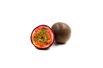 Tasty passion fruit isolated on white background. Half and whole passion fruit.