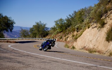 Obraz premium motorcycle rider in the mountains