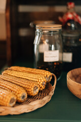 corn on the cob in a wicker bowl