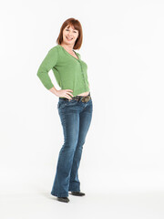 Fototapeta premium A Friendly Face. A friendly smile and body language from a casually dressed mature woman.