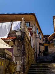Stone Stairway and Traditional Building with Hanging Laundry
