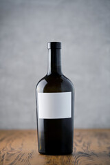 Blank Label Wine Bottle on Wooden Table