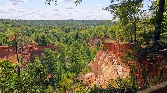 Providence Cayon Park, a manmade canyon and a fun mimic of the Grand Canyon. It spans approximately 1,003 acres, features dramatic canyons with vibrant colors created by erosion due to poor farming