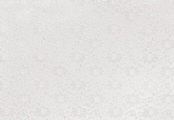 Closeup of White lace with flowers on white background
