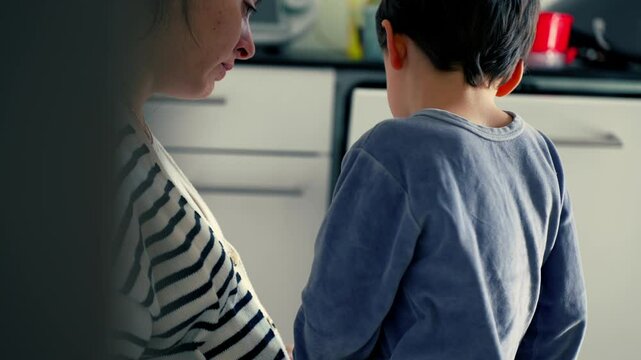 Tearful Child Learns Lesson from Mother's Scolding, Nods in Understanding