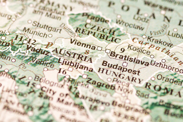 World map. Austria on the geographical map, world tourism, destination. Political map close-up photo.