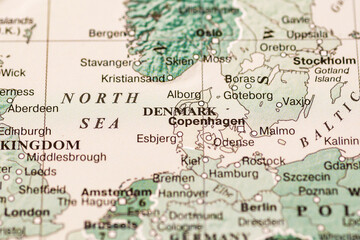 World map.Denmark on the geographical map, world tourism, destination. Political map close-up photo.