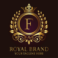 Elegant logo design F with golden crown and leaves for luxury brands and royal-themed businesses  
