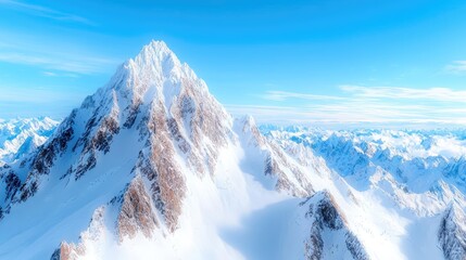 Snowy mountain peak, aerial view, clear sky, winter landscape, travel poster
