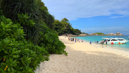 Trip to Thailand. Travel photo.
Sea, sun, beach, island.
Summer vacation. Boat, yacht on azure water.