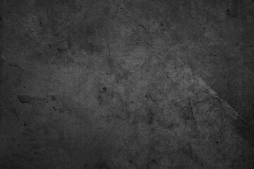 Dark grey textured concrete background