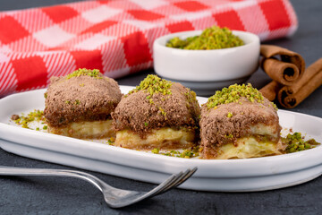  Turkish dessert cold baklava on black background
