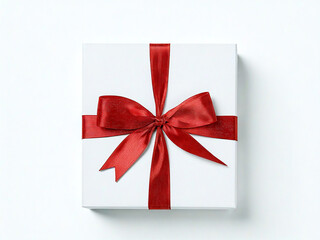 top view of a white gift box with red ribbon