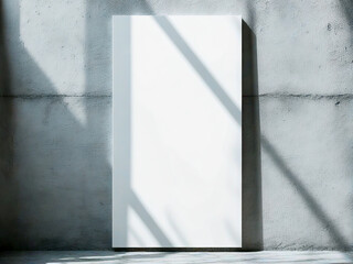 empty room with concrete wall and white empty frame