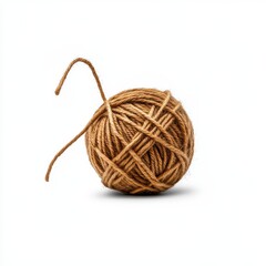 Obraz premium A beautifully textured ball of natural jute twine displayed on a clean white background, perfect for crafting and decorations.