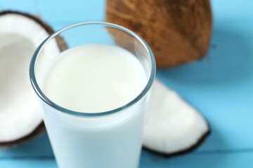 Glass of milk with coconuts on the table